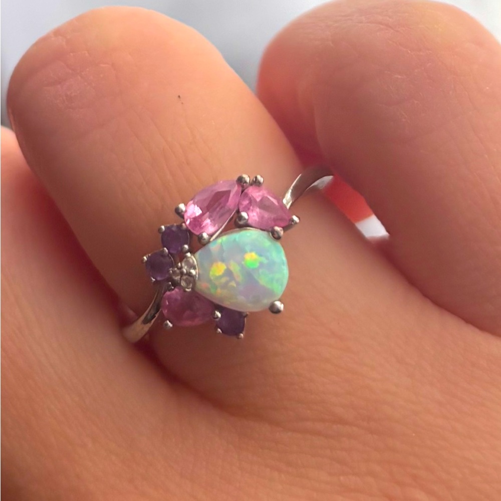 Opal ring with pink and purple side stones